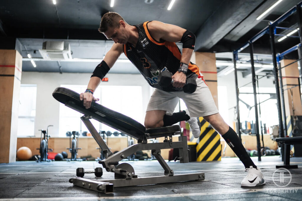 man dumbbells training in gym