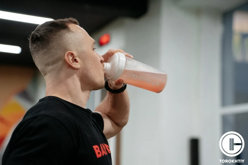 Athlete Drinks Citrulline On Training