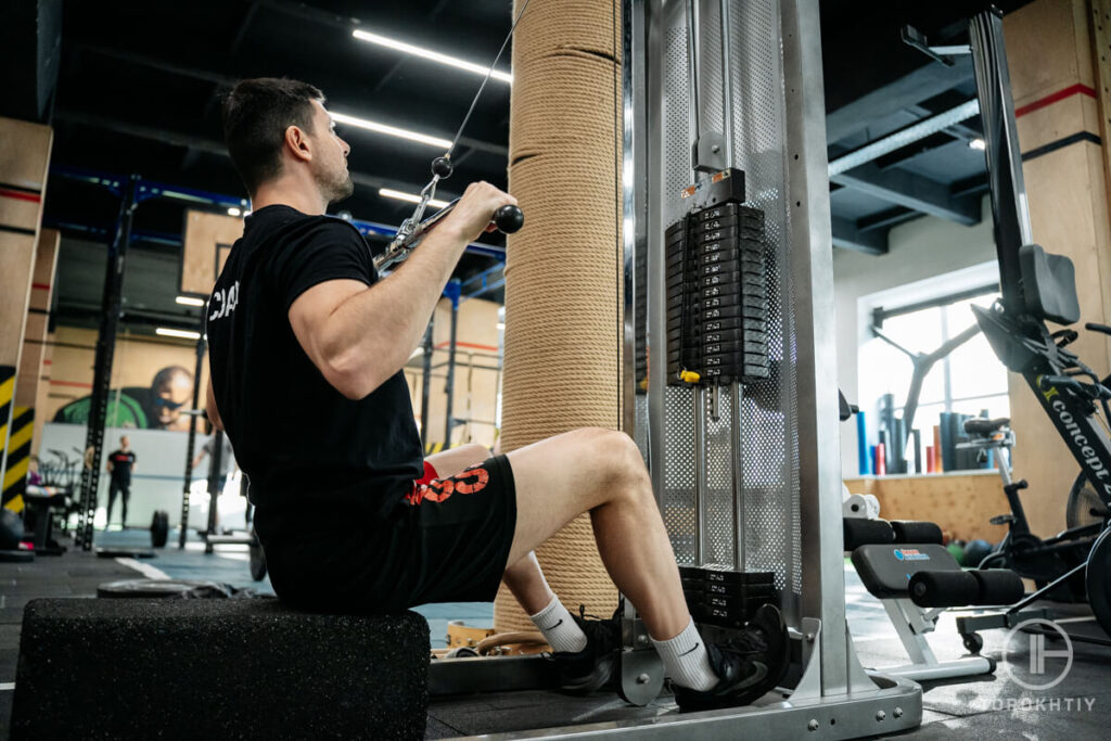 Athlete Workout Using Cable Machine