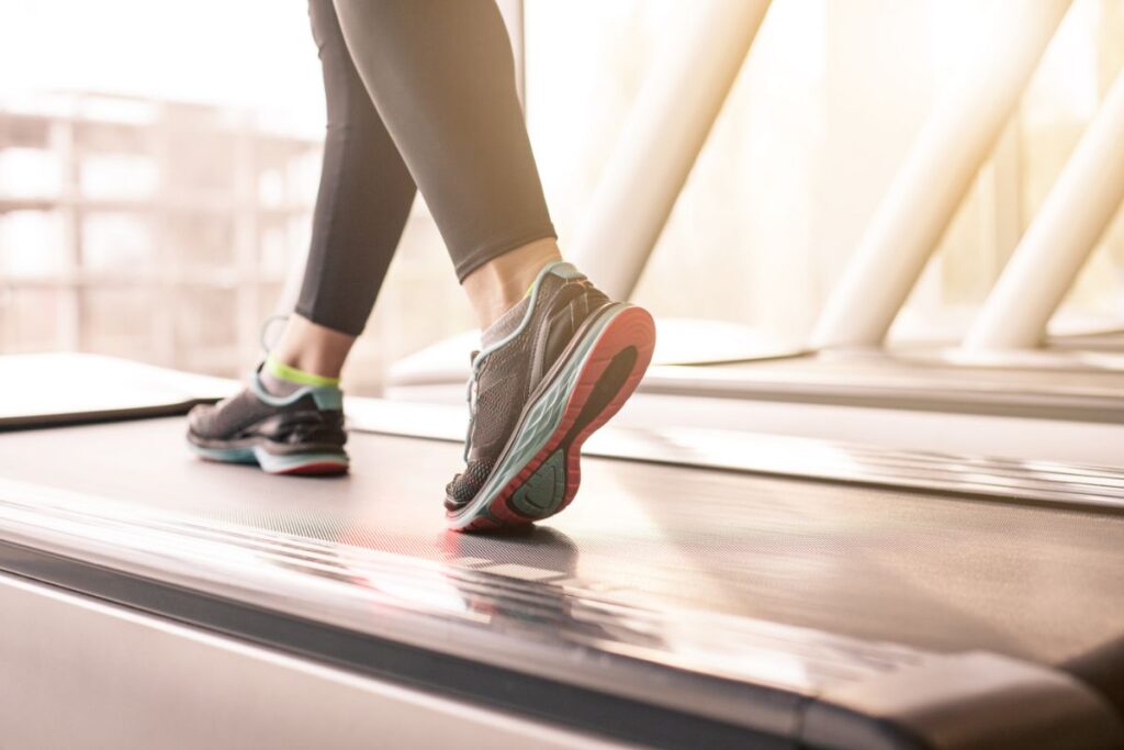 Woman training on treadmill