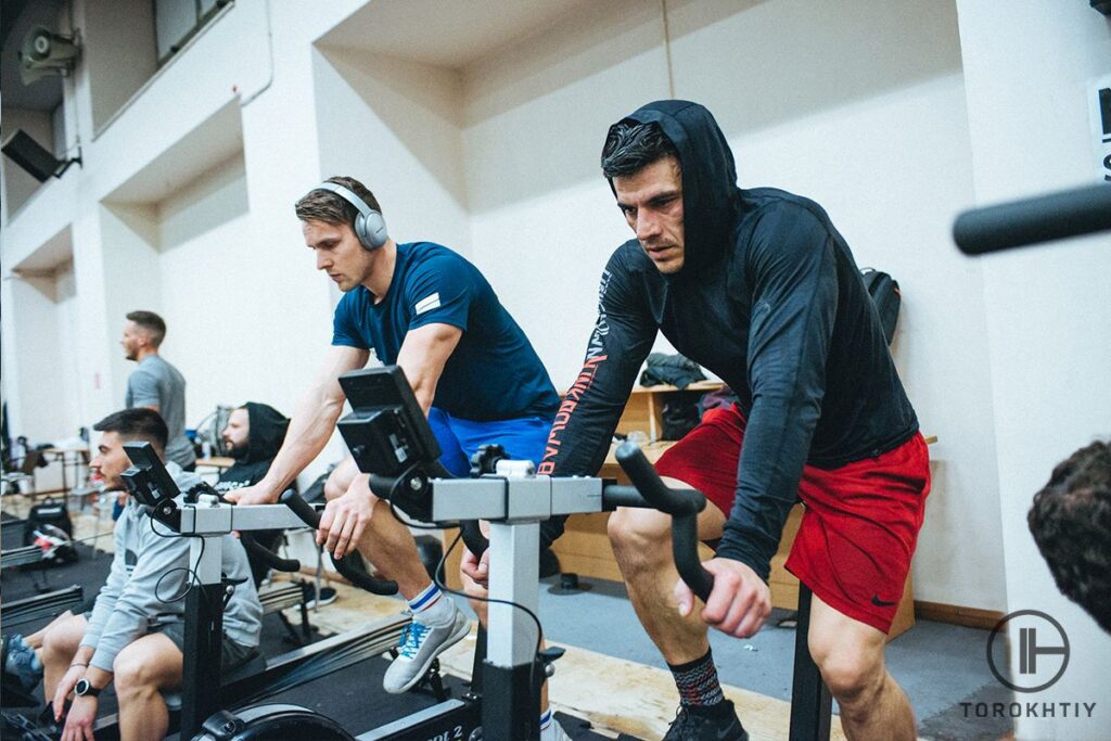 Cycling on an exercise bike in gym