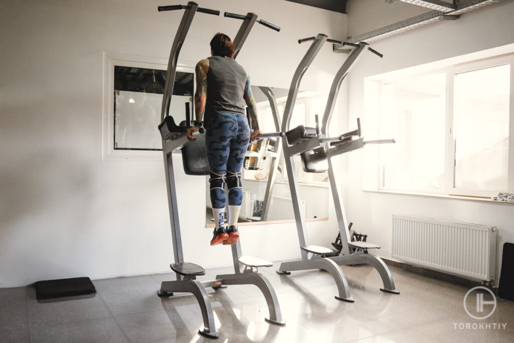 Woman training on tower tower