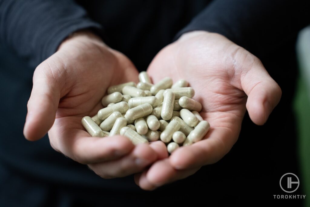 Capsules in hands