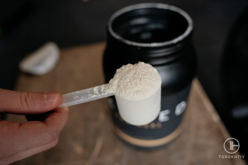 Protein powder in scoop