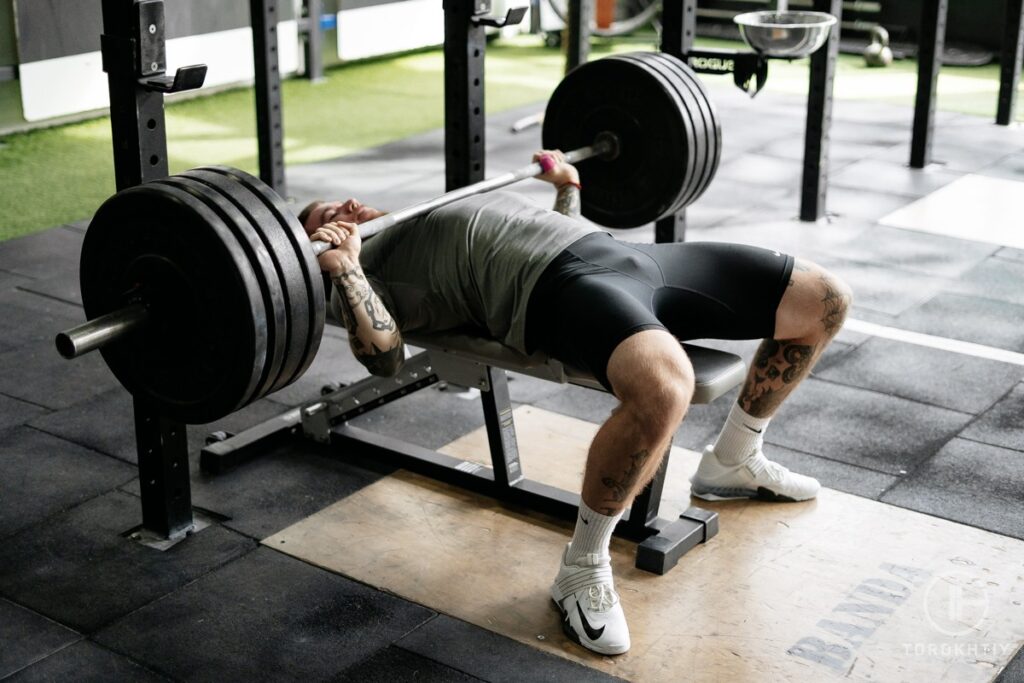 Doing Bench Press in The Gym