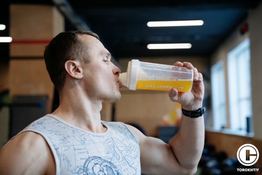 athlete drinks electrolytes