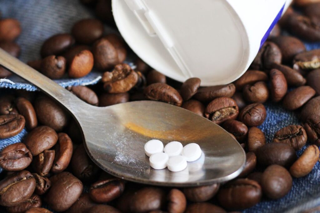 sweetener capsules in spoon