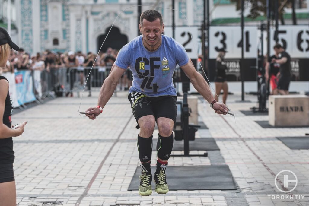 athlete jumping using jump rope