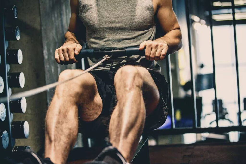 using rowing machine in the gym