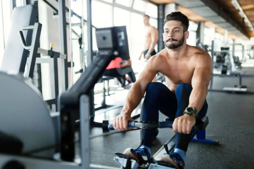 athlete training on rowing machine