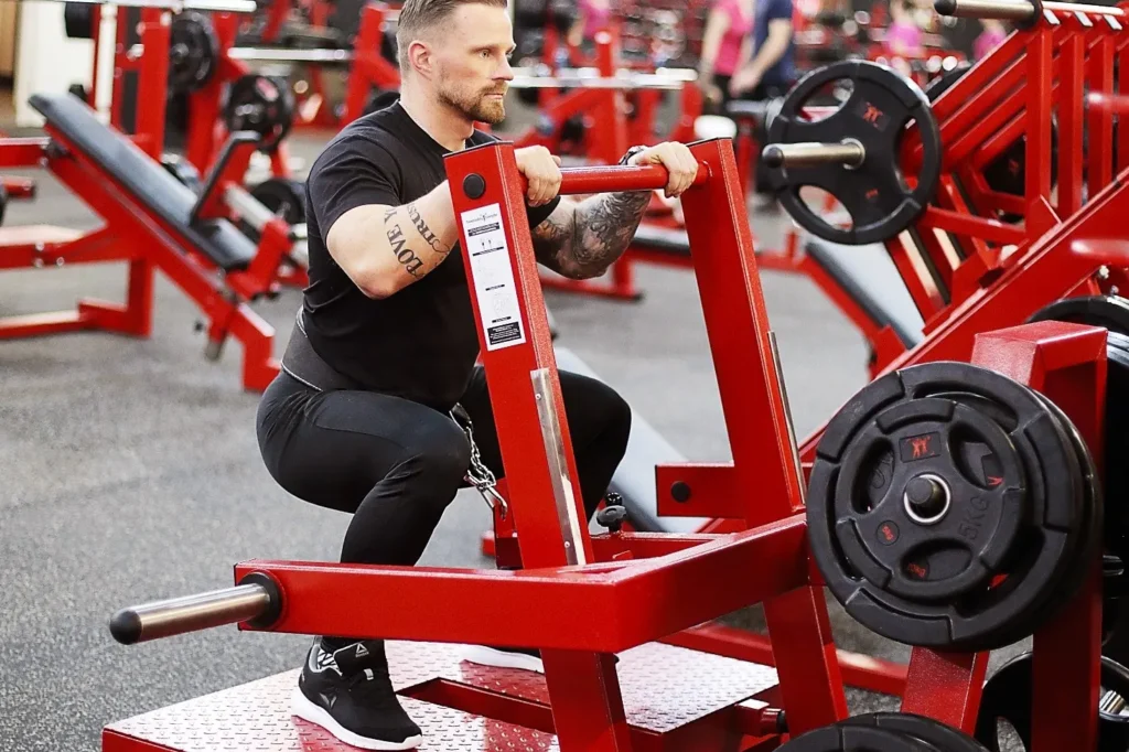 belt squat machine in use