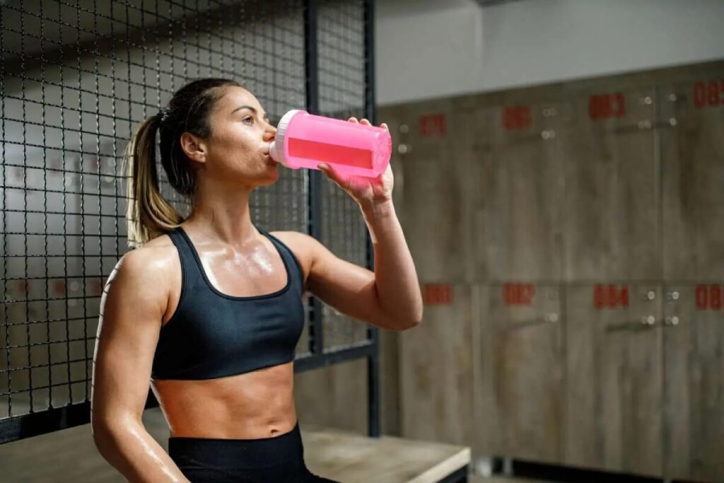 Female Taking Pre-Workout