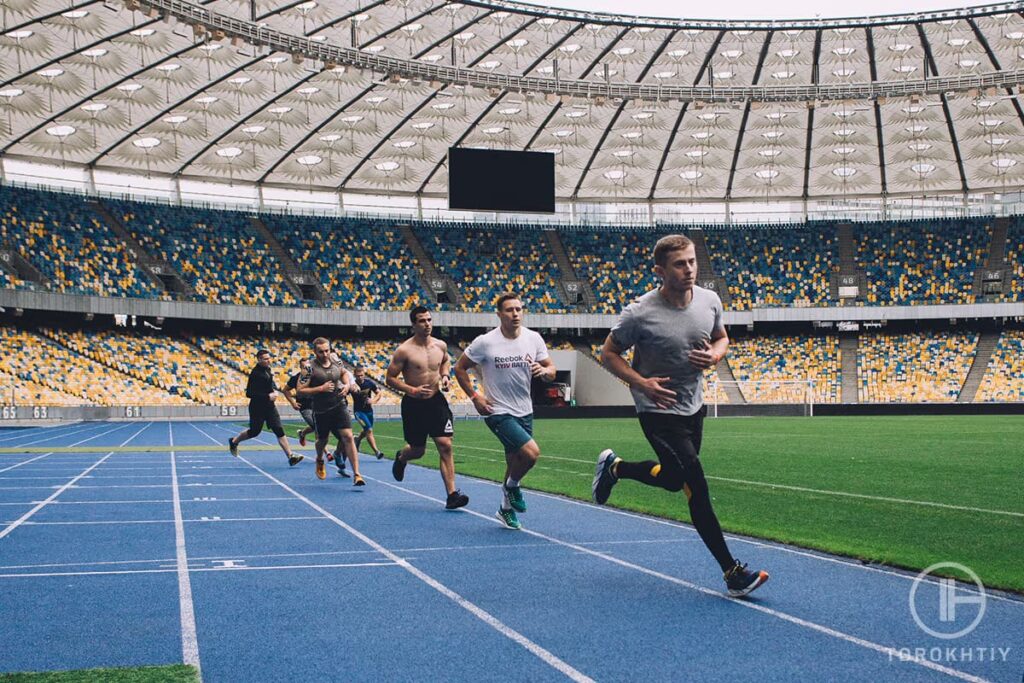 runners at the stadium