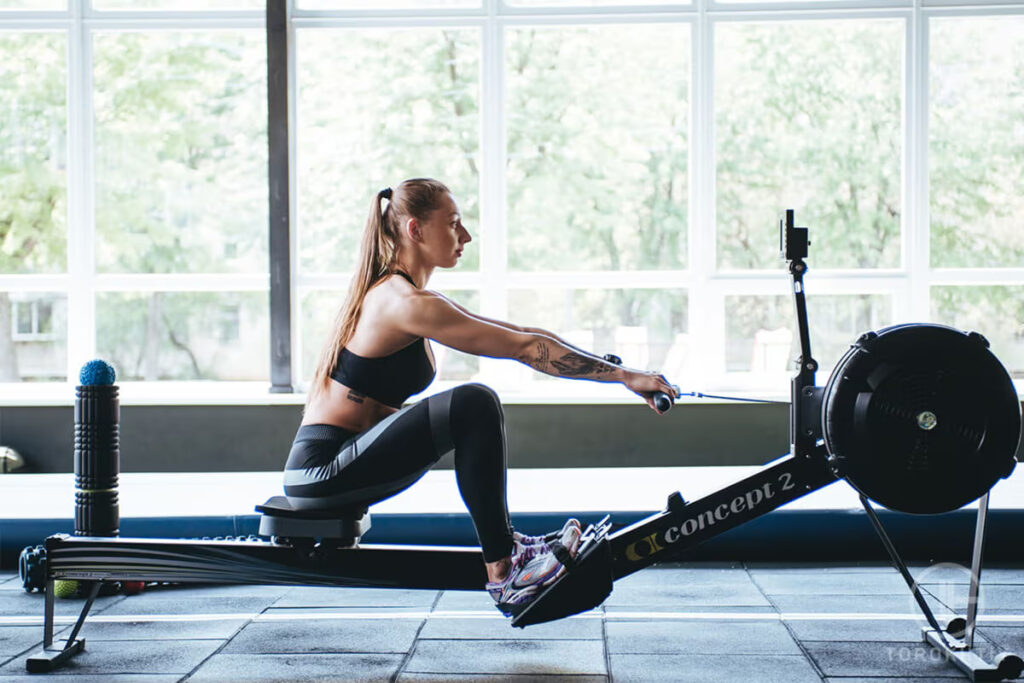 using air resistance rowing machine