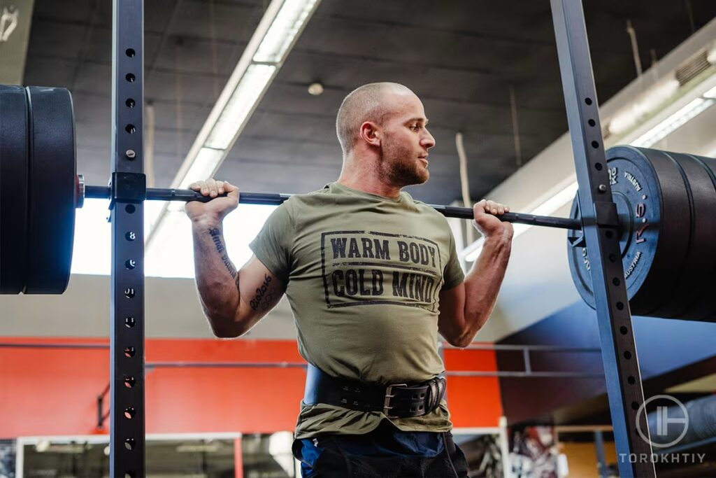 athlete deadlifting in gym