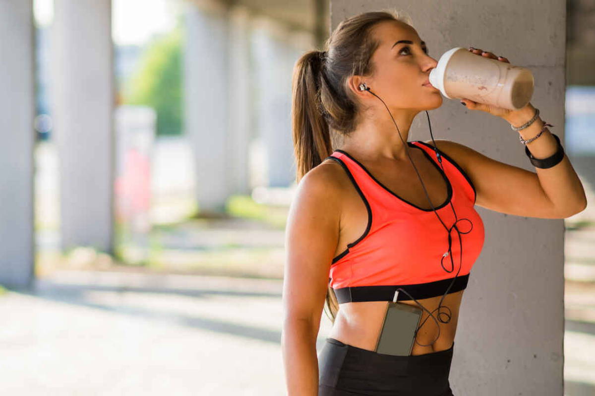 Athlete drinking protein