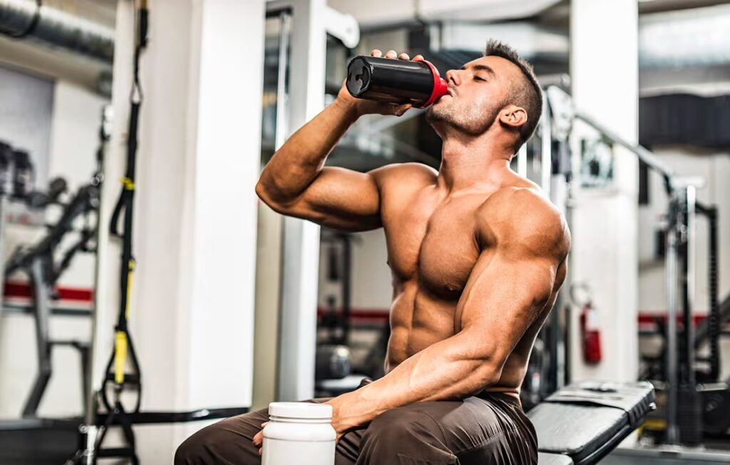 athlete drinking protein