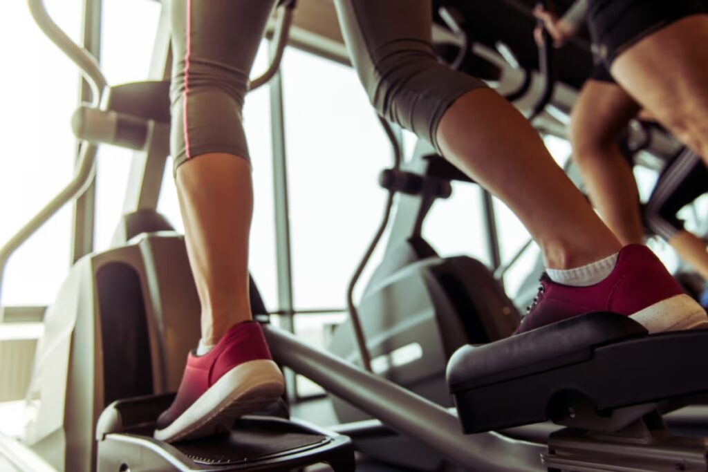 athlete exercising on elliptical