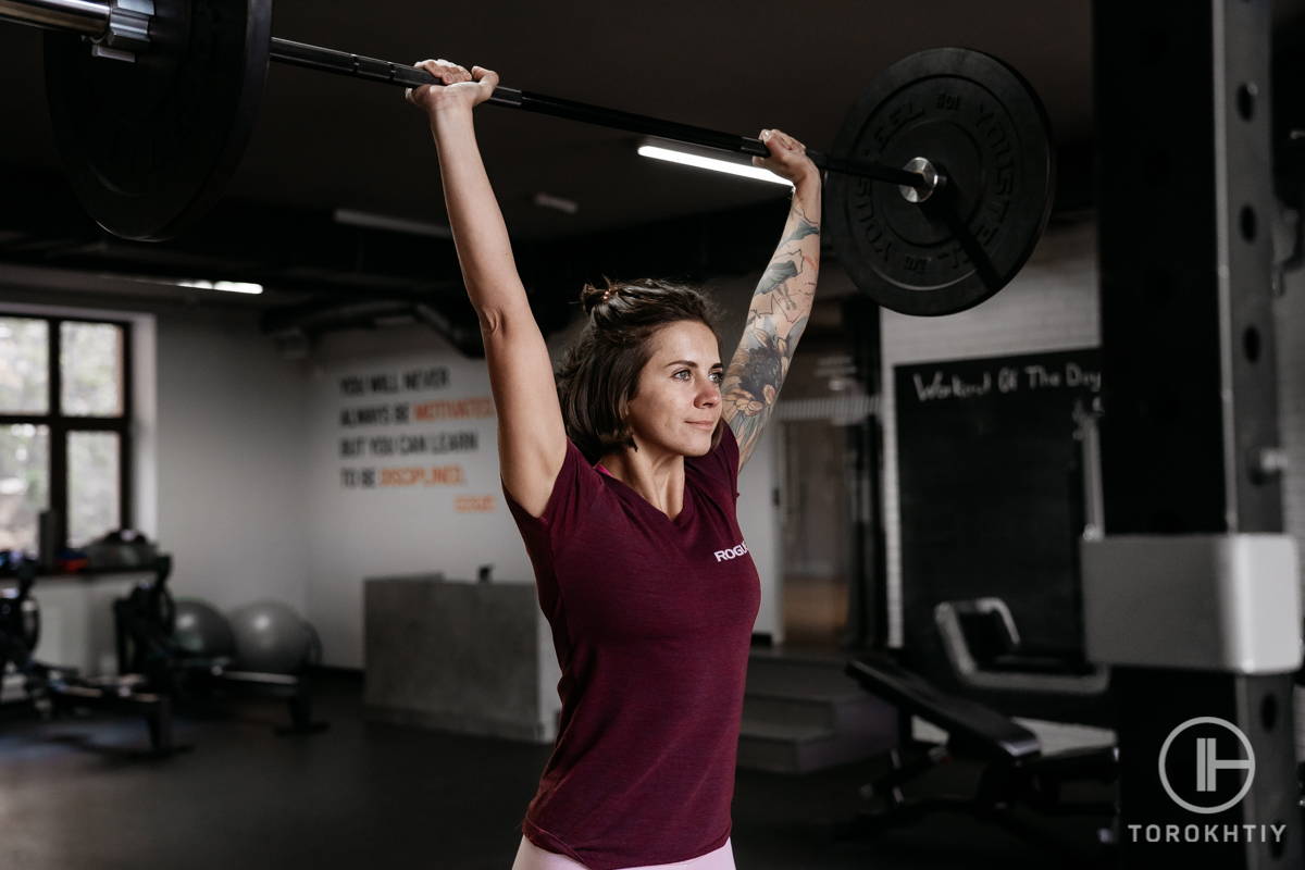 Female athlete deadlifting