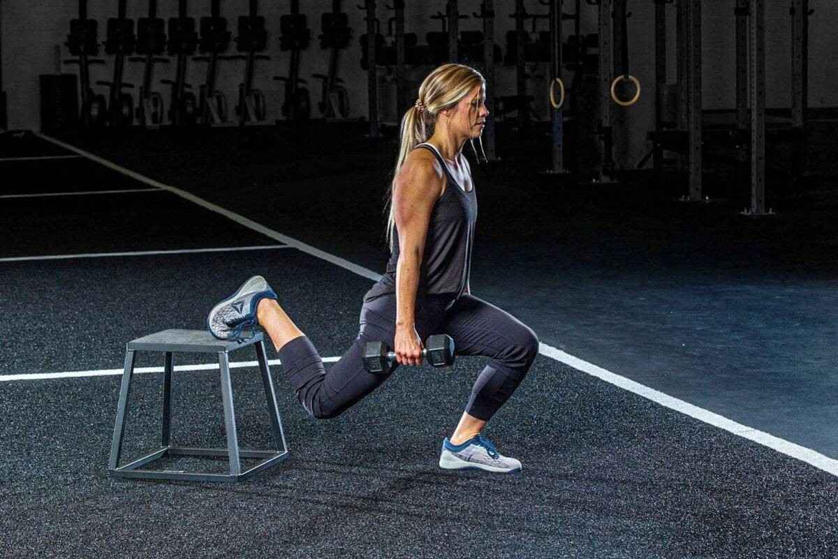 Female athlete training on plyo box