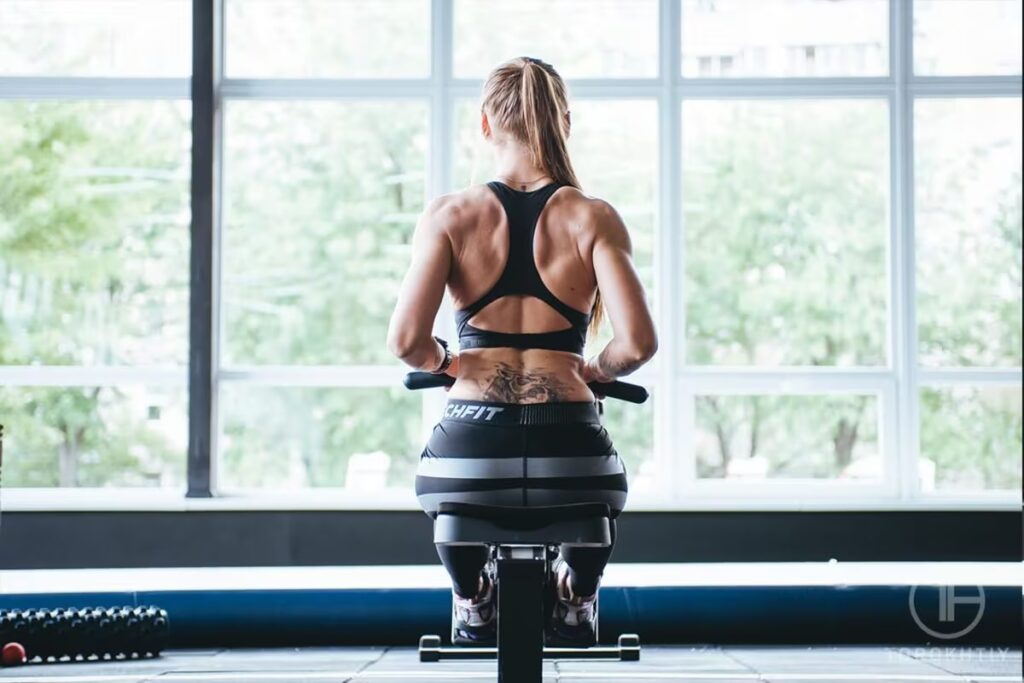 girl on rowing machine