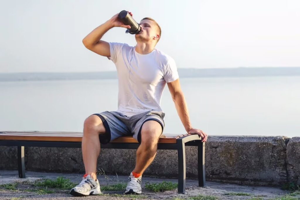 man drinking protein shake