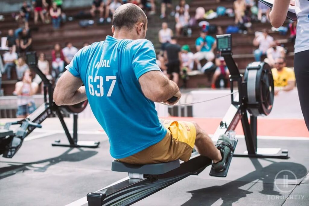 man on rowing machine