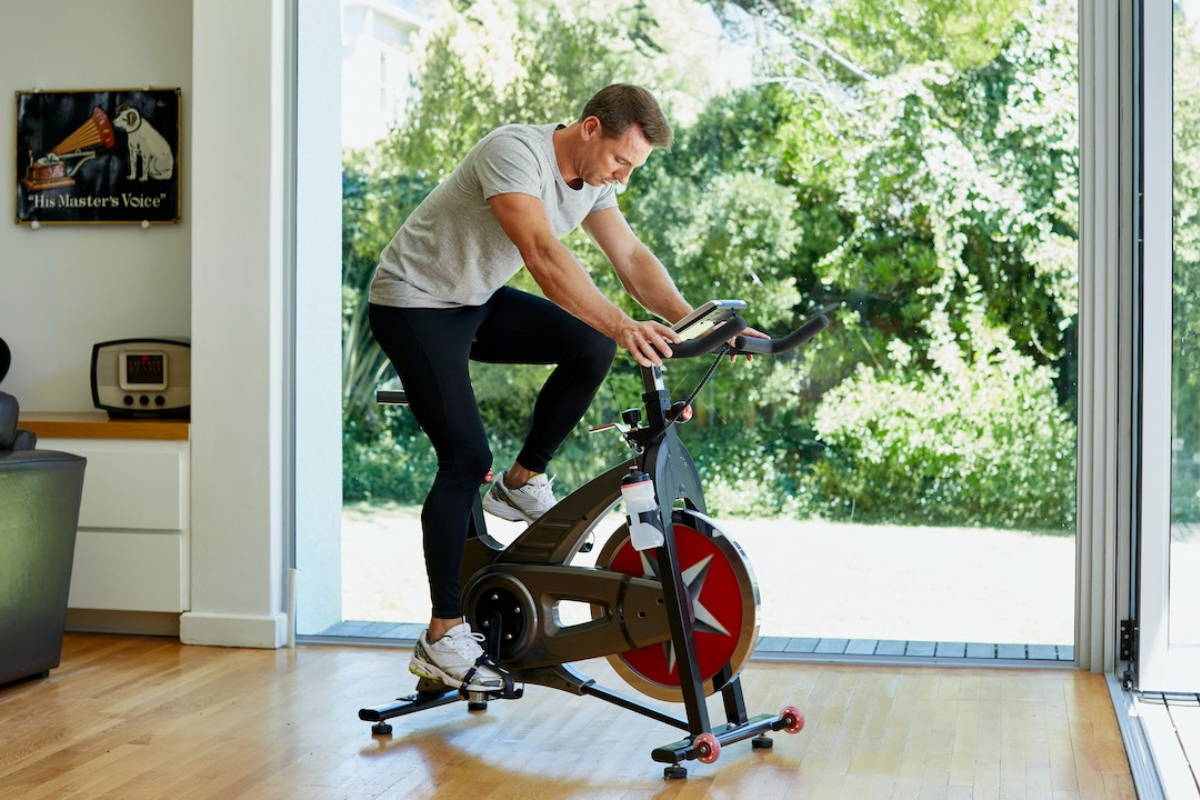 Man training on stationary bike