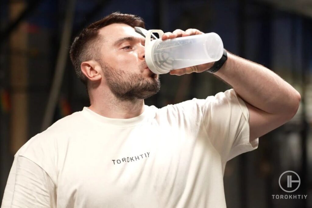 Athlete Drinking Creatine