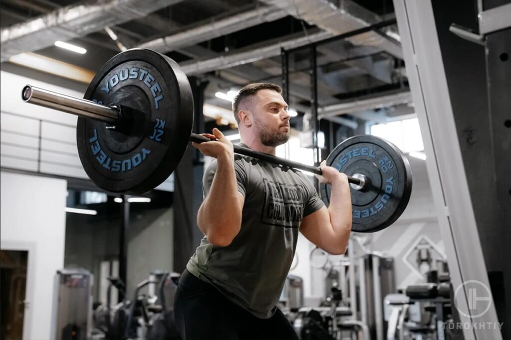 athlete lifting a barbell