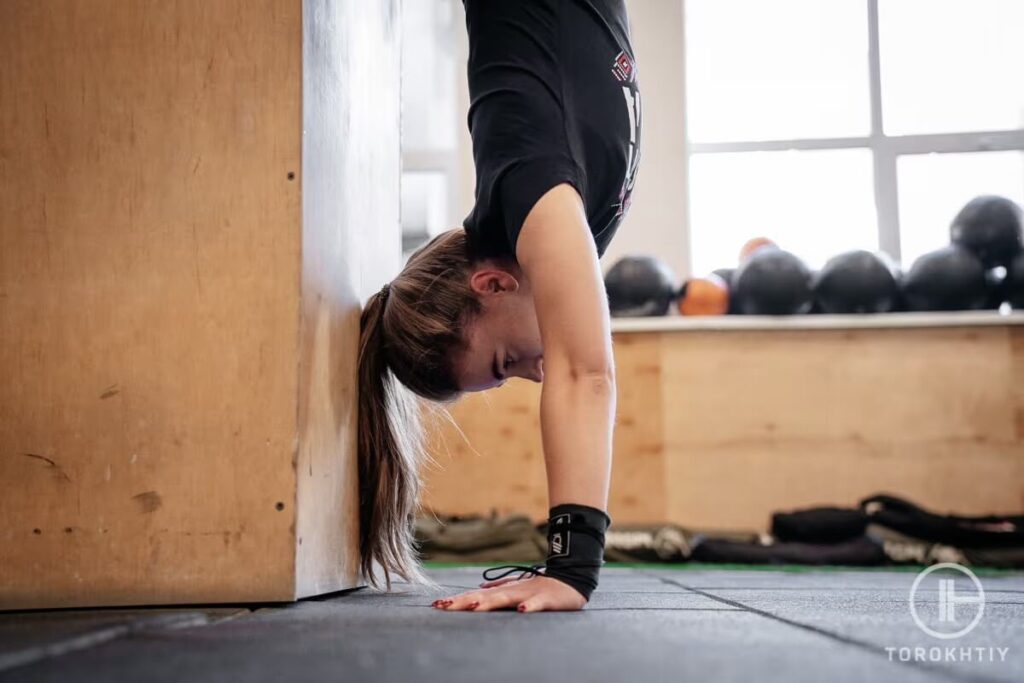 Support Wrists During Handstand