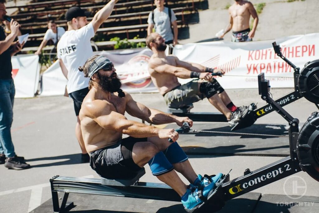 athlete in sunglasses rowing