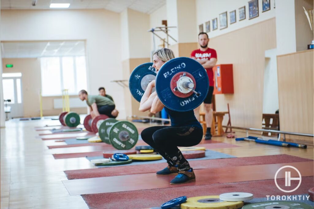 Female Front Squat In Gym