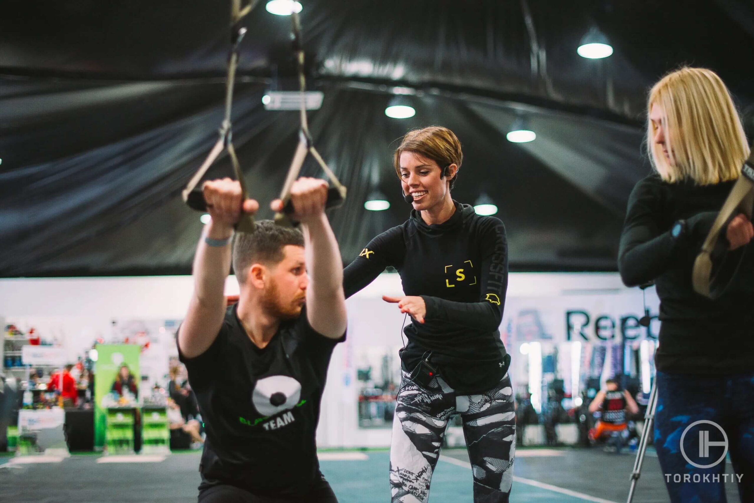 athlete man trains with suspension trainer