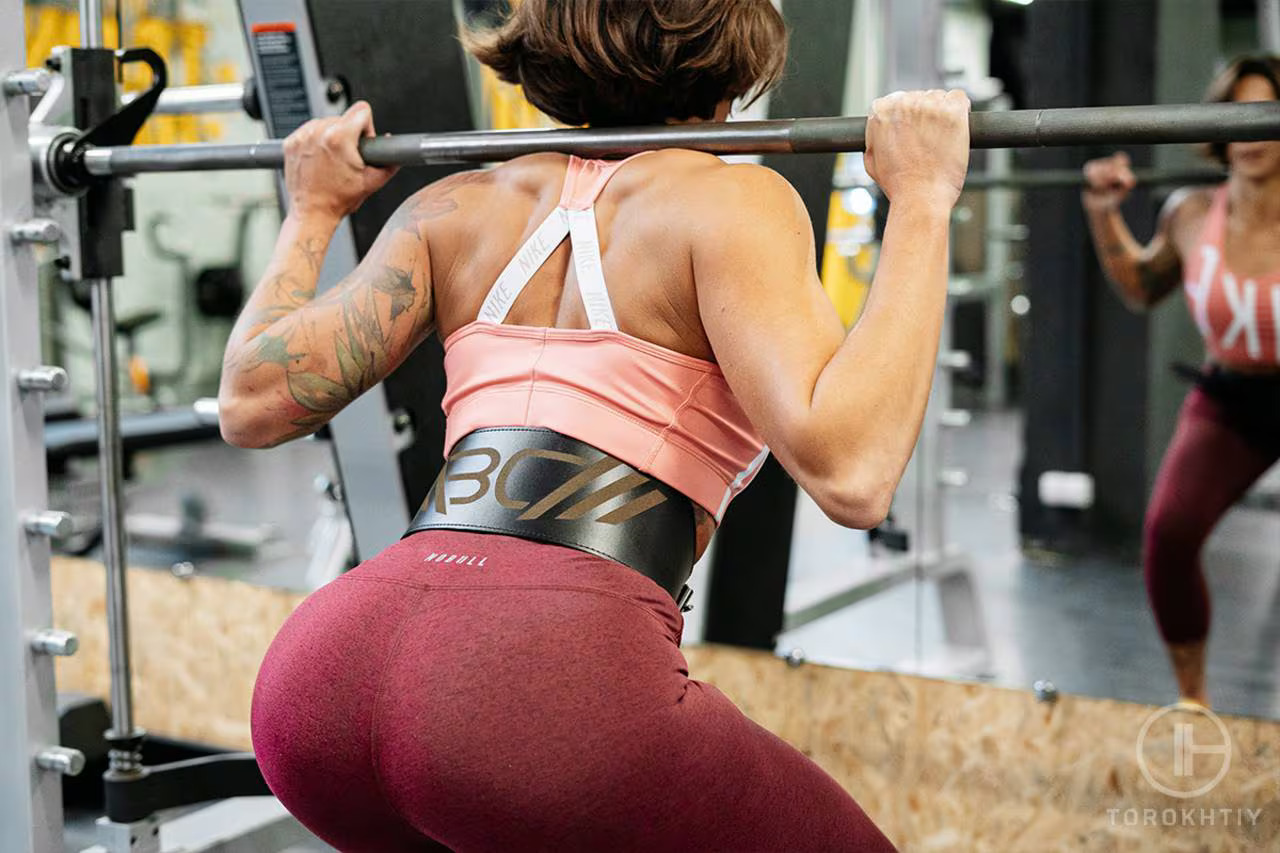 athlete woman wearing WBCM Weight LiftingBelt