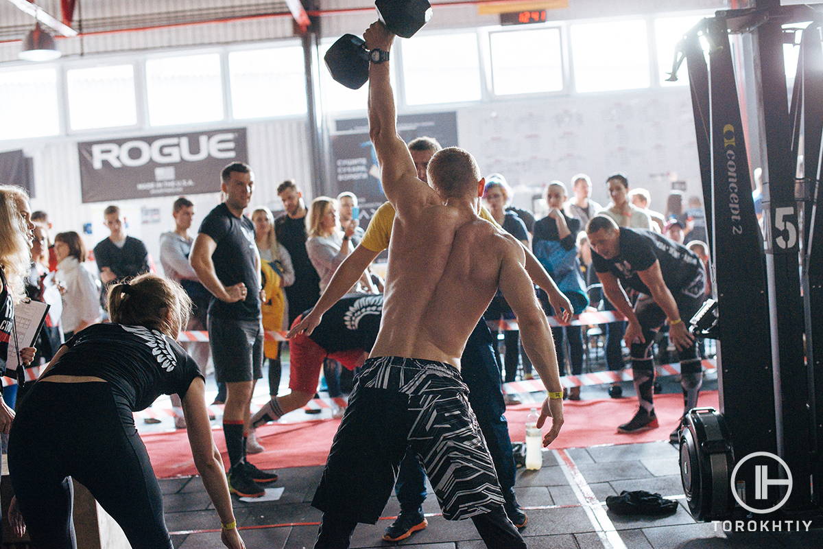 WBCM the man performing dumbell press