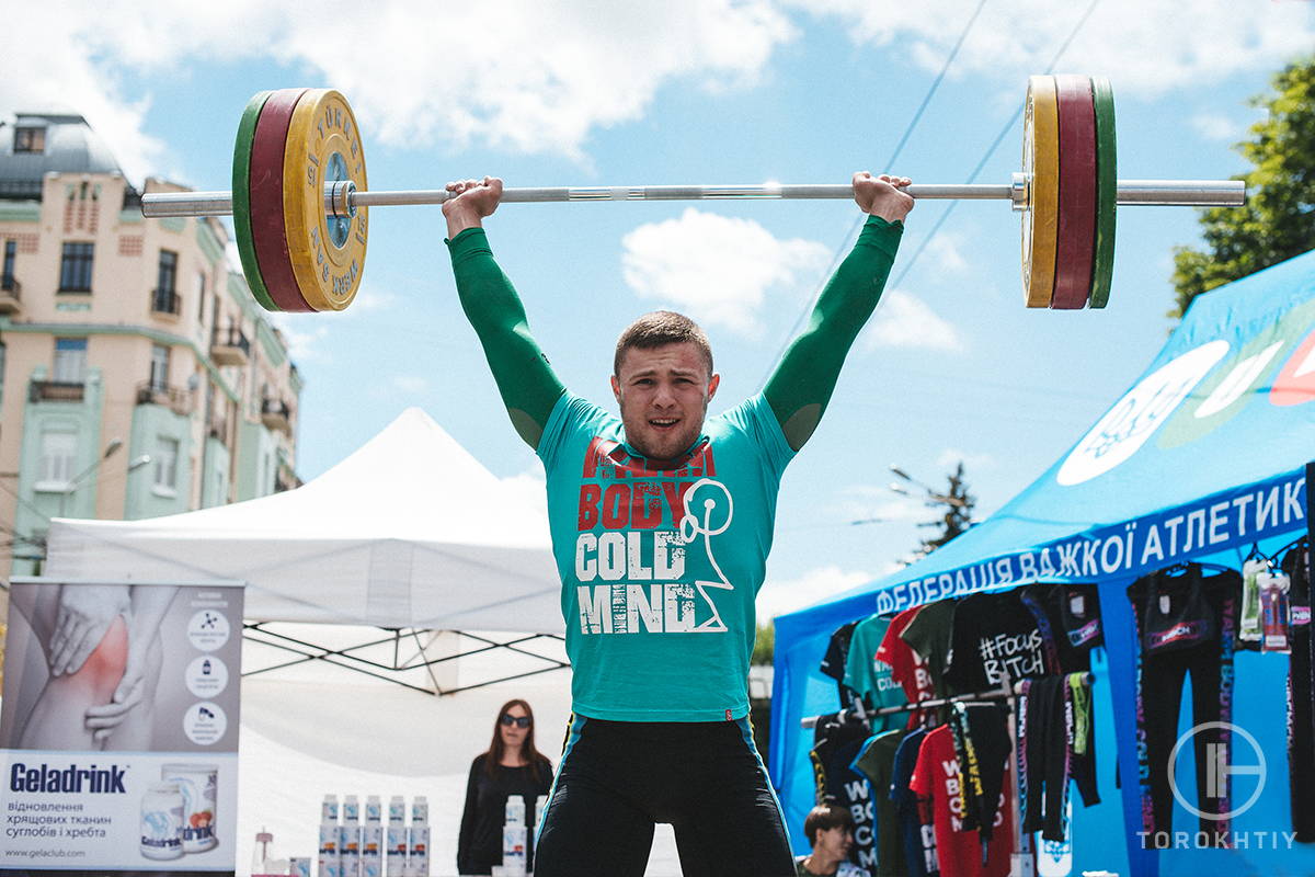 WBCM man is pushing the weight bar