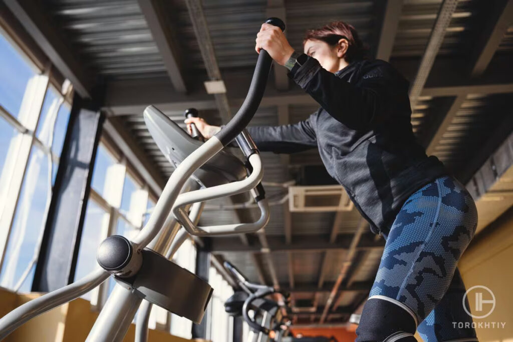 athlete on elliptical torokhtiy