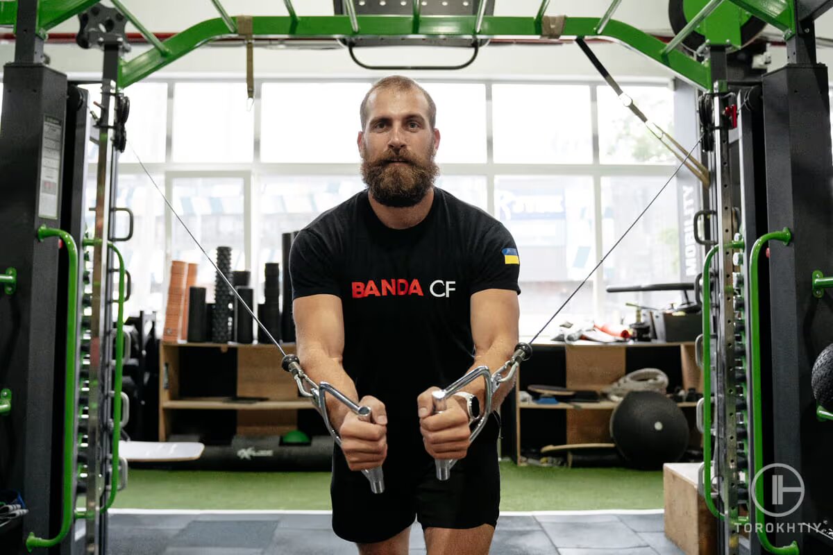 athlete works out in gym