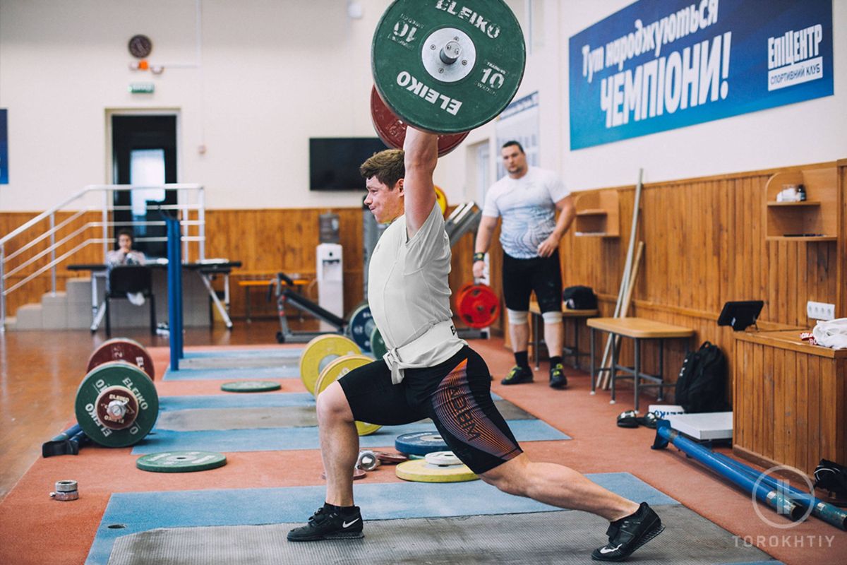 athlete training with barbell