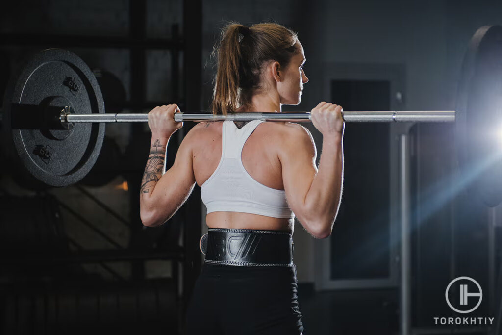 woman's barbell in use