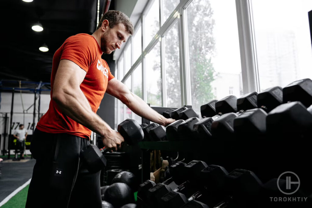 Dumbbells Training in Gym