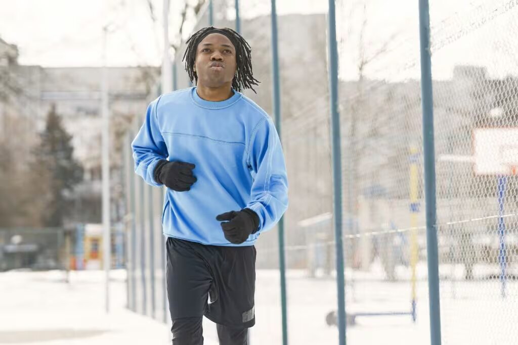 man running in gloves