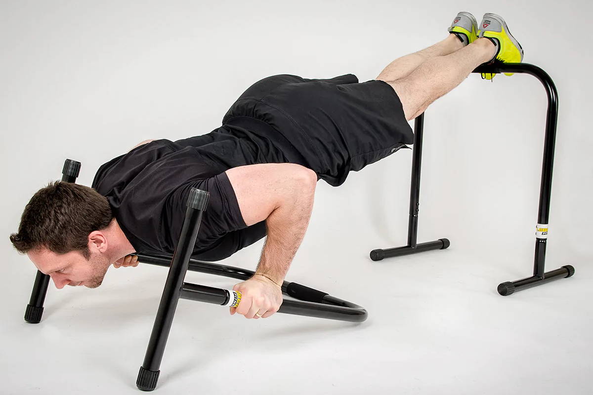 Man training on Portable Dip Bars