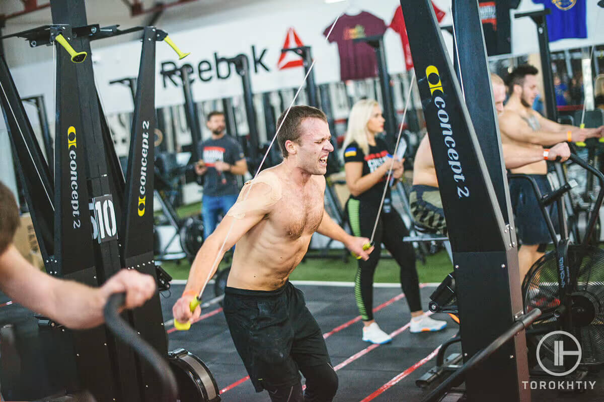 Concept2 skierg and athlete in gym