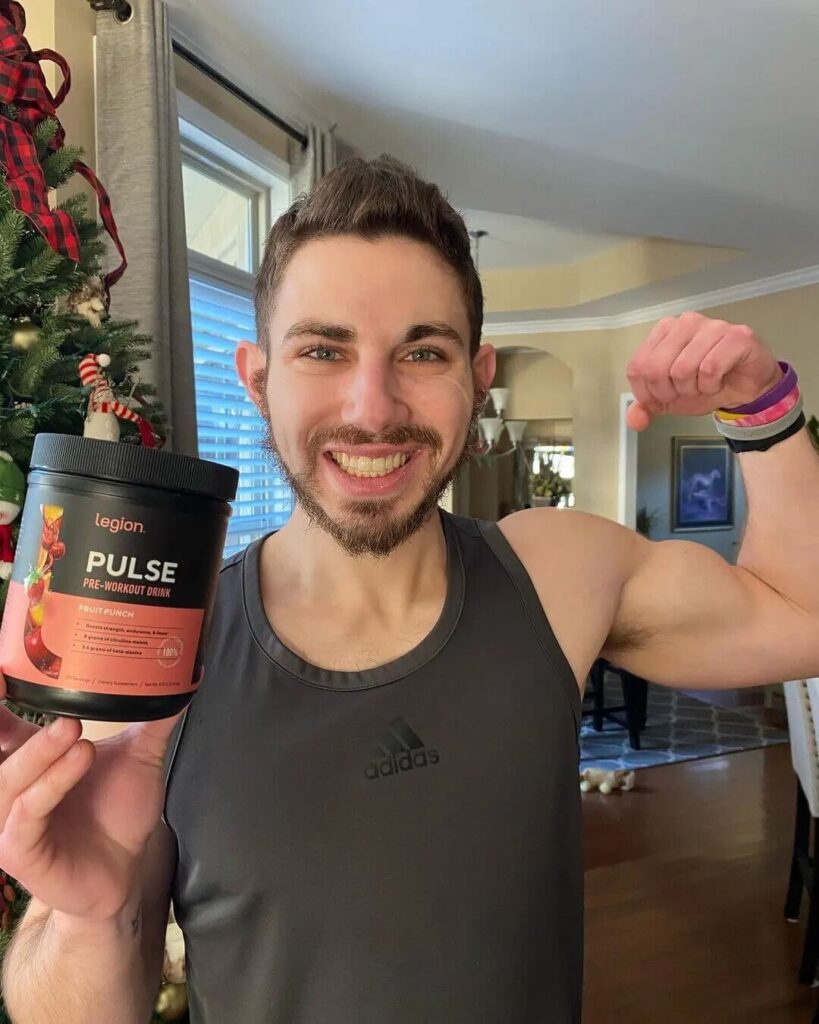 man holds legion pulse bottle